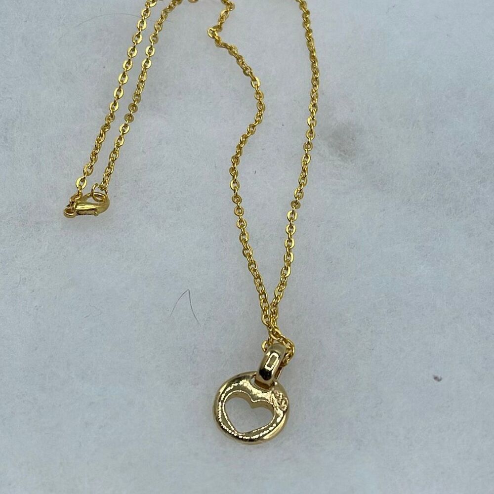 Premier Designs goldtone heart to heart pendant necklace.